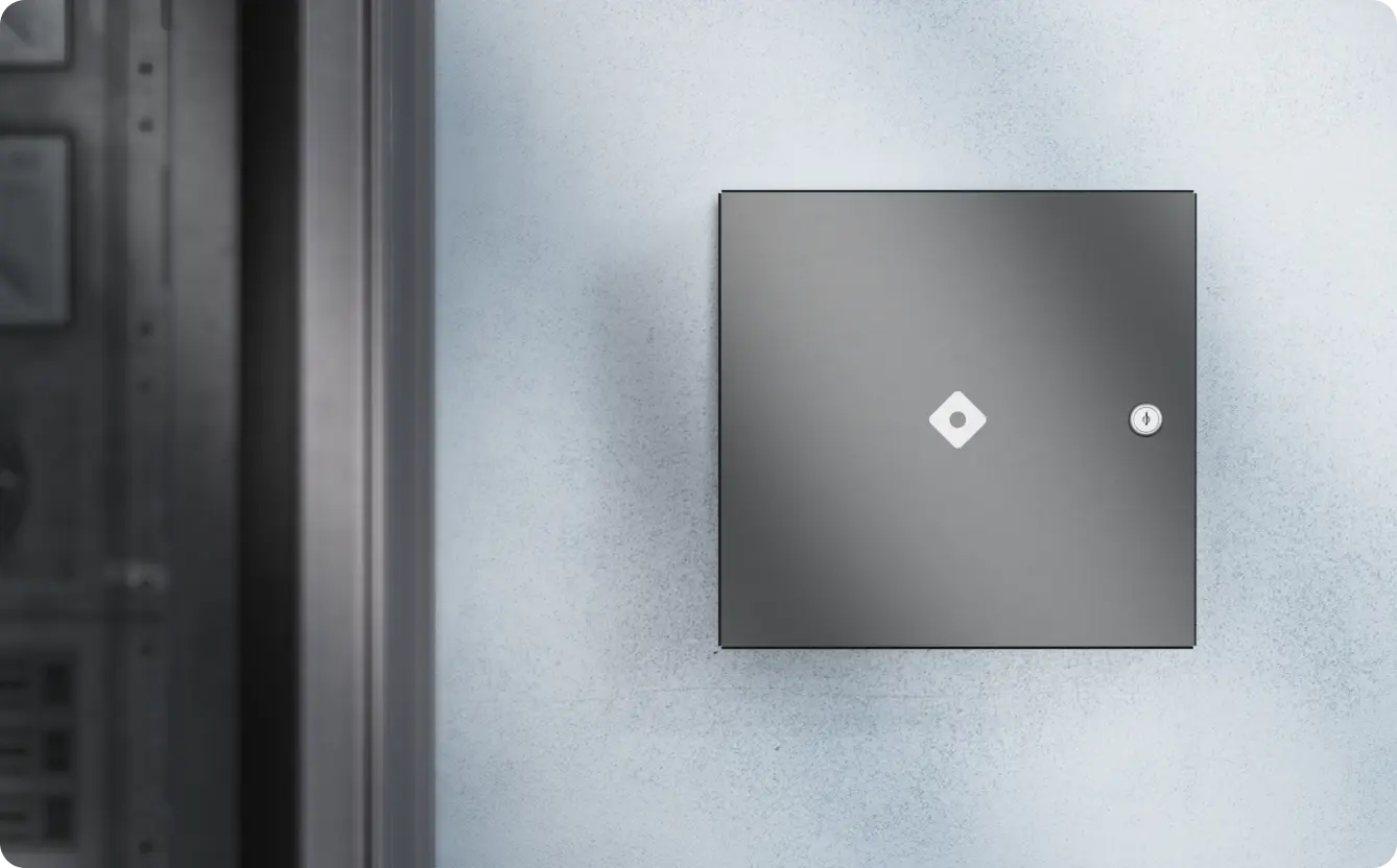 Rhombus DR20 door card reader next to office door, providing employees seamless access and security benefits.