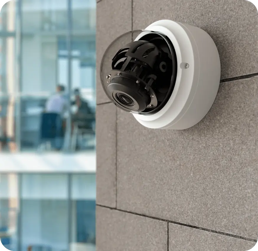 High-quality dome security camera installed on an office wall, part of an advanced dome security camera system. This dome camera features night vision capabilities and is designed for both indoor and outdoor use, ensuring comprehensive surveillance.