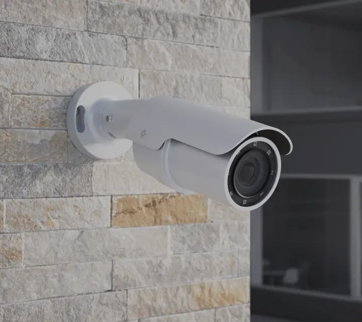 R540 bullet security camera in parking lot, delivering long-range detail with night vision for high-quality surveillance footage