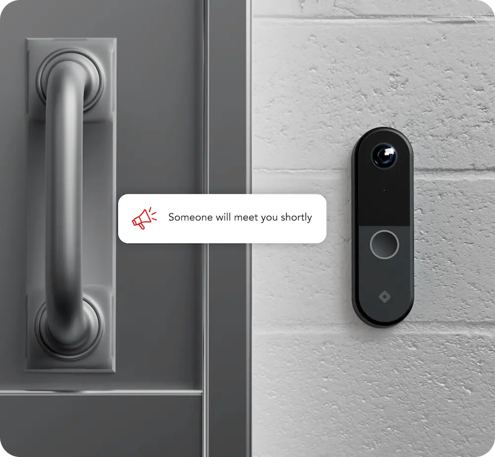 Rhombus DR40 door reader installed beside a door, showcasing a part of rhombus commercial access control systems.