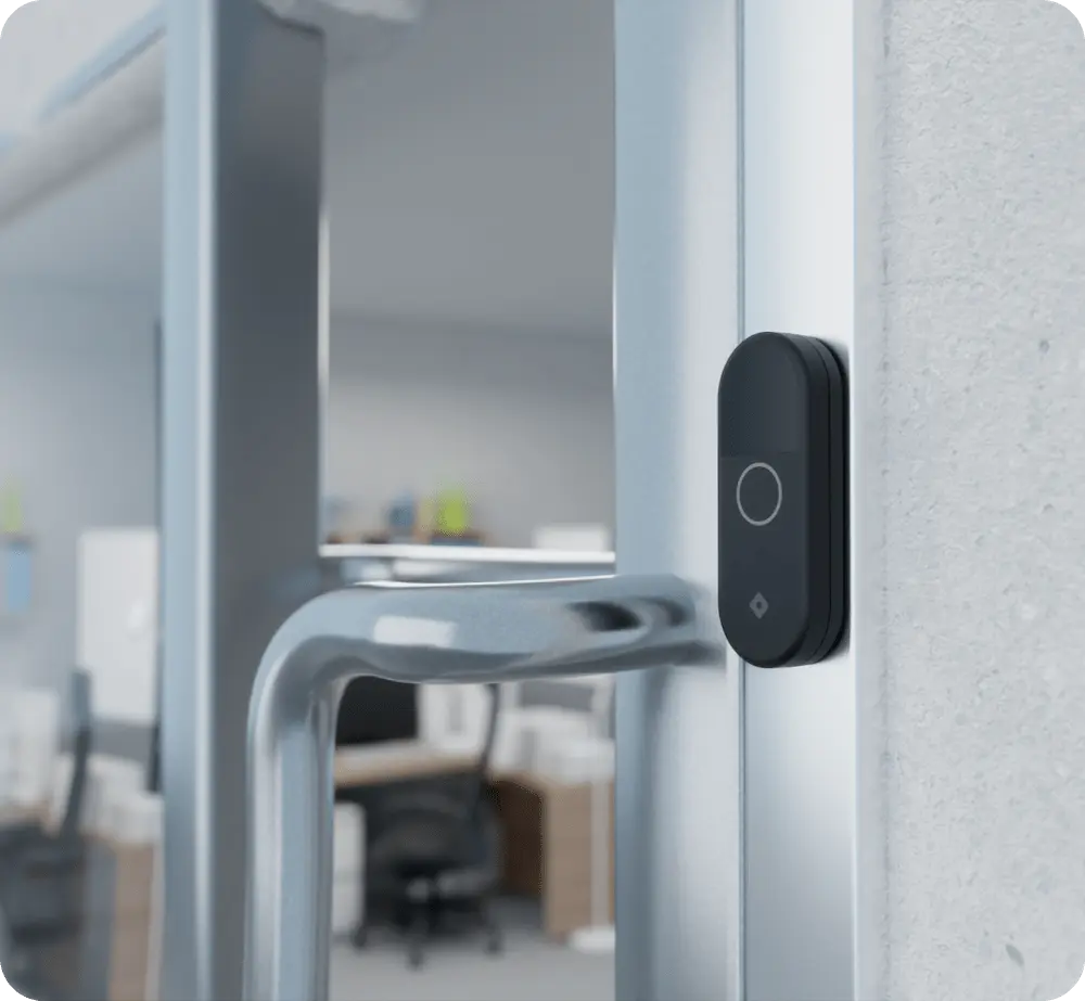 Rhombus door reader, DC20 which is one of the access control readers offered by Rhombus for access control systems, is installed next to a door in an office building, exemplifying how access control systems enhance security.