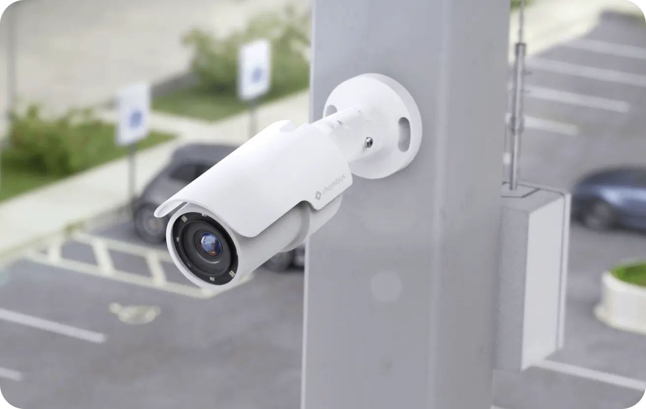 a Rhombus bullet camera mounted in parking lot