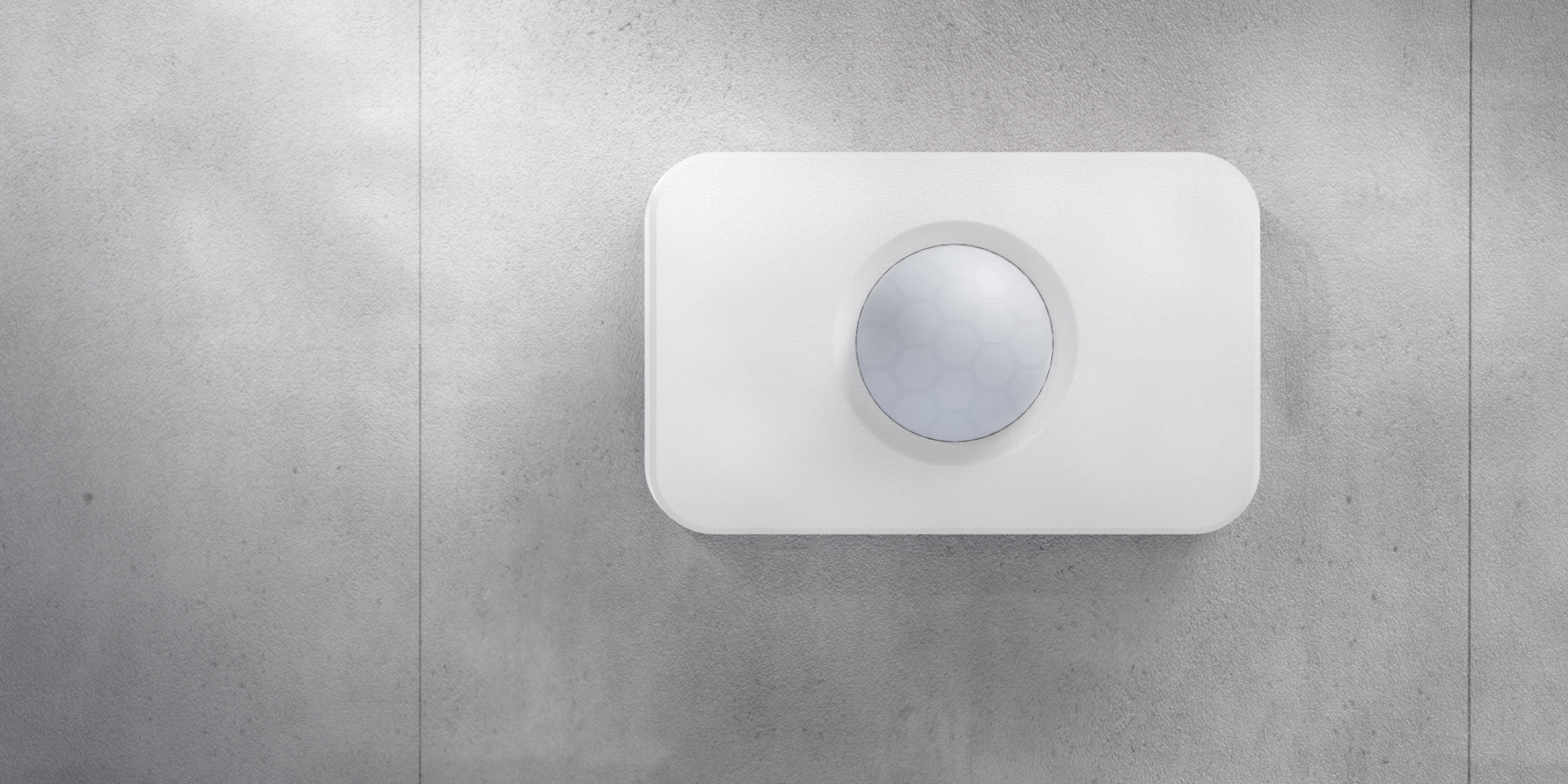 The M15 motion sensor, mounted on a wall, monitors camera less locations and delivers real-time insights through advanced motion sensing technology