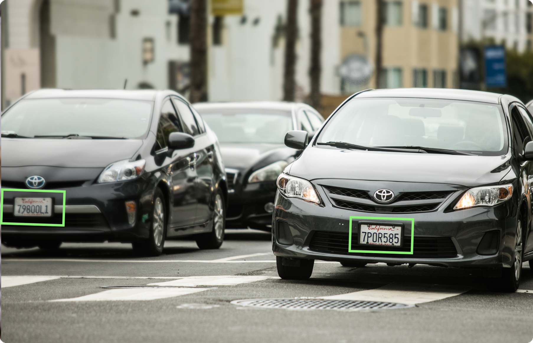 Cars driving on the road with license plate recognition
