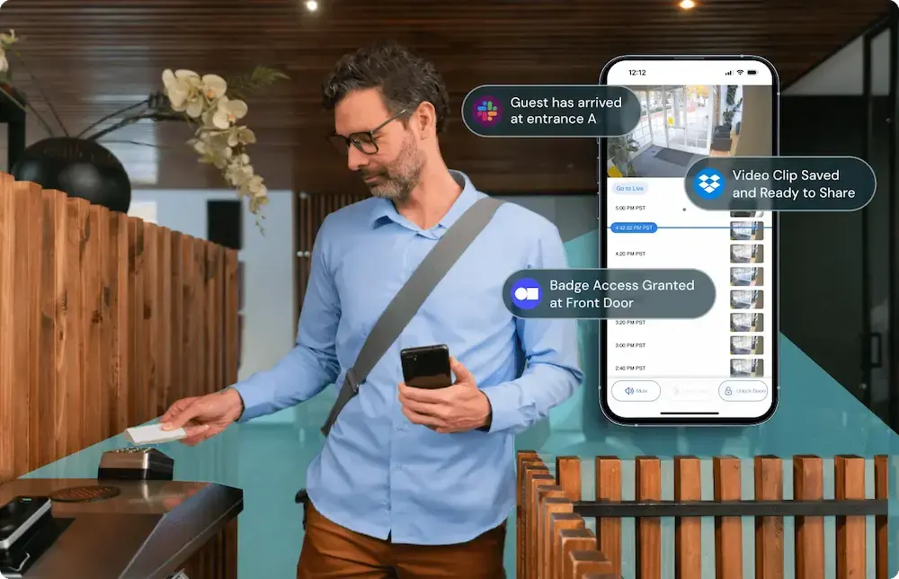 Person walking through gated access control area with key card