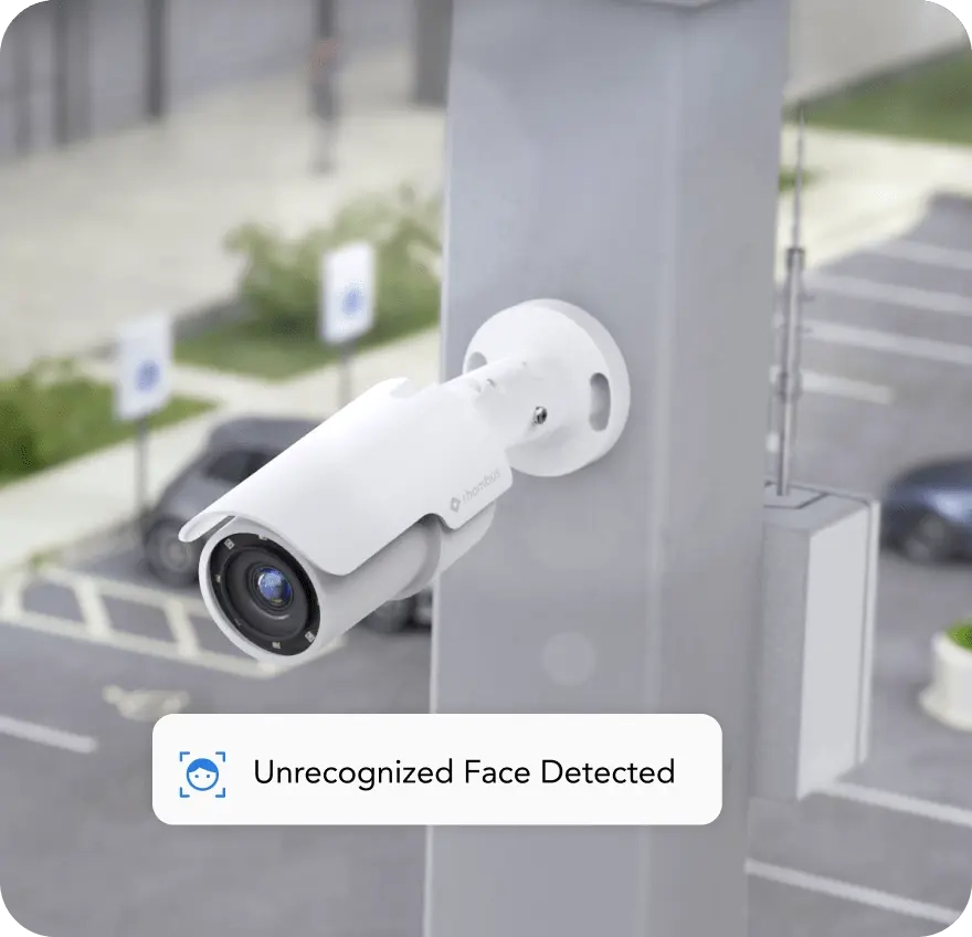 Bullet security camera placed in a parking lot, designed for effective surveillance to deliver long-range detail.