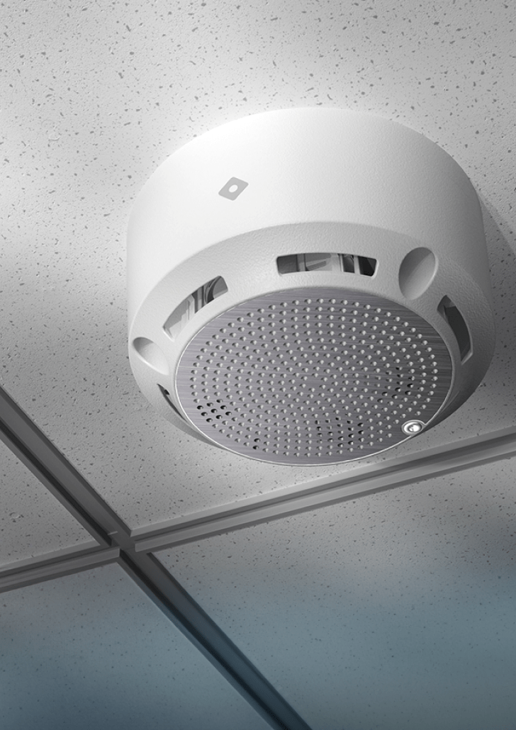 The IoT sensor E50, installed on a ceiling, has multiple sensors—temperature sensors, pressure sensors, chemical sensors, gas sensors, humidity sensors, and more—to help track environmental parameters. It detect leaks and safeguards spaces with proactive alerts.