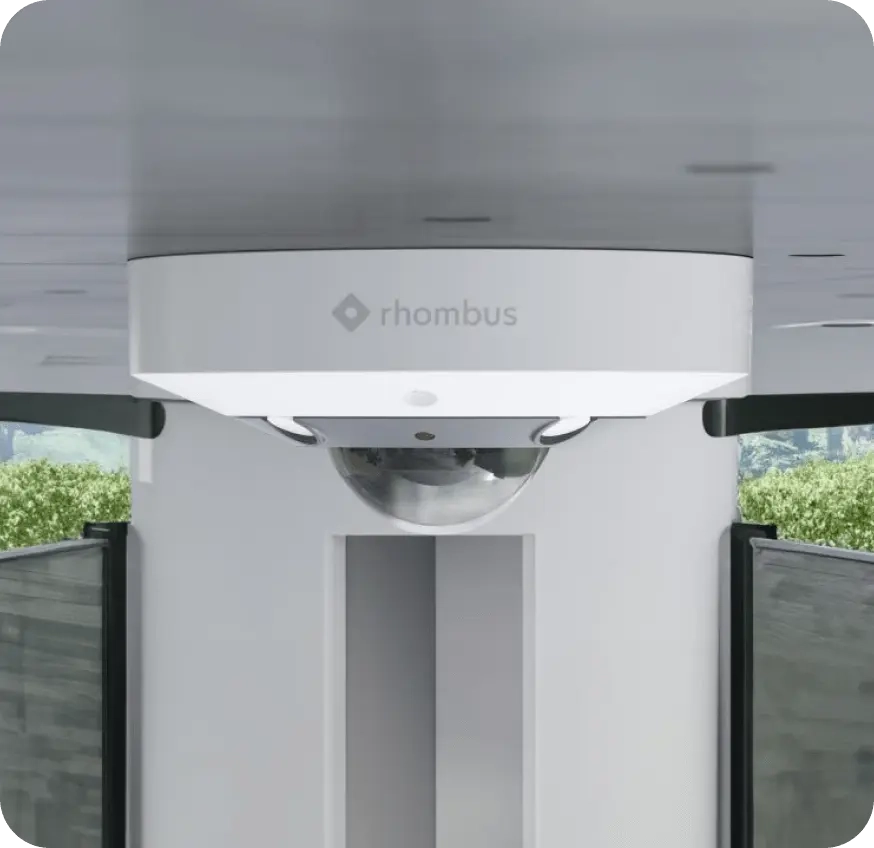 Rhombus fisheye camera on a ceiling, featuring a fisheye lens to enhance security with wide-angle IP camera capabilities.