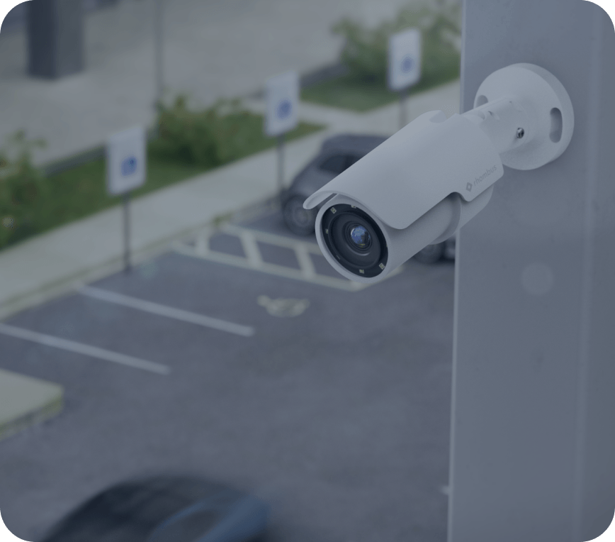 R500 bullet security camera in parking lot, delivering long-range detail with night vision for high-quality surveillance footage